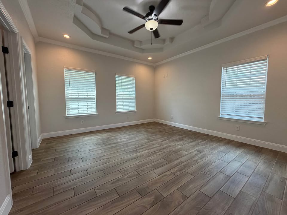 Bedroom with decorative ceiling