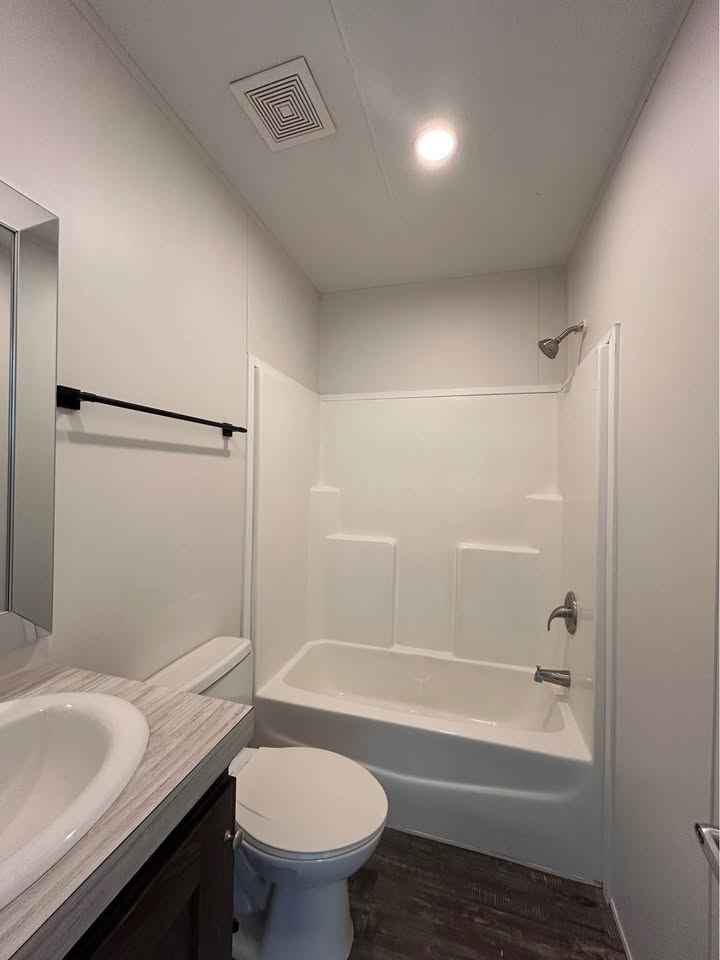 Bathroom with tub and shower